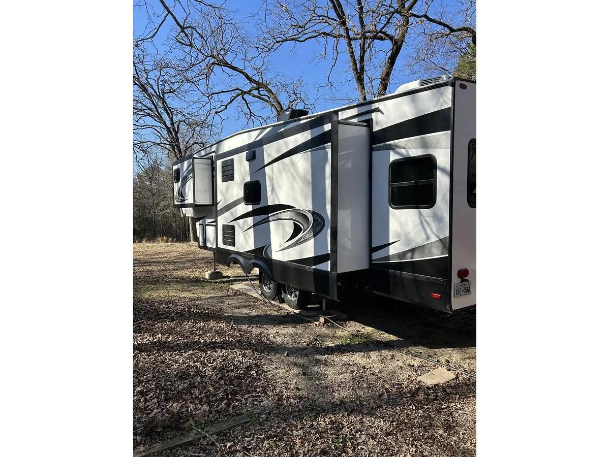 Used 2021 Grand Design Solitude 303RLS