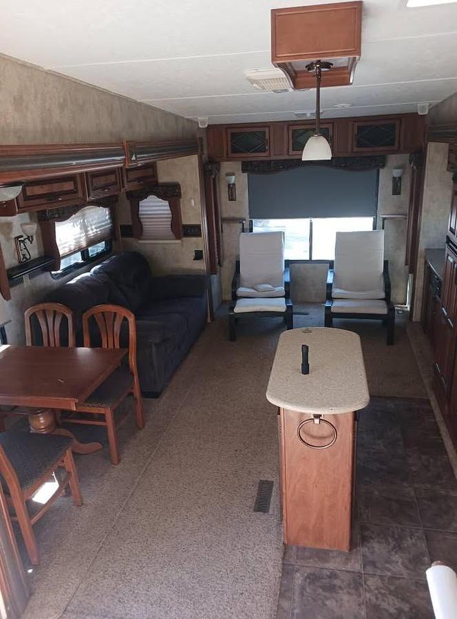 Used 2012 Keystone Loredo 324RL Fifth Wheel