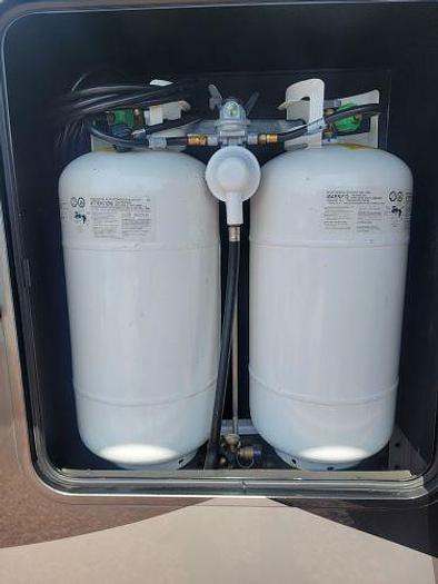 Used 2022 Forest River Riverstone Legacy Fifth Wheel Toy Hauler