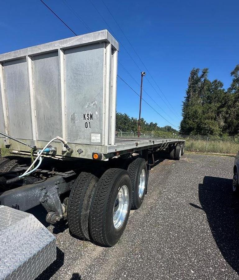 Used 2005 WESTERN STAR 4900EX Day Cab with 1991 Rave 53’ Flatbed Trailer