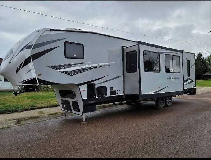 Used 2022 Forest River Cherokee Wolf Pack 315PACK12 and 2019 KTM 250 XC-W