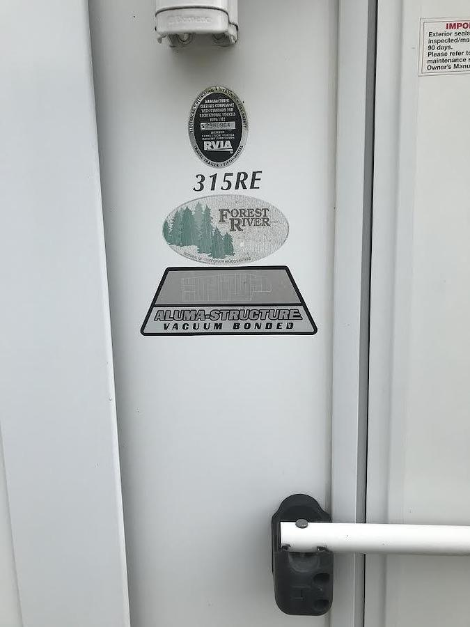 Used 2013 Forest River Sandpiper 315RE Fifth Wheel