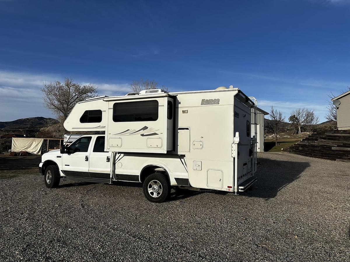 Used 2004 Lance 1161 Cab Over Camper Mounted on a 2005 Ford F350 Lariat