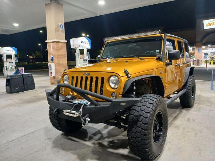 Used 2014 Jeep Wrangler Unlimited Sport