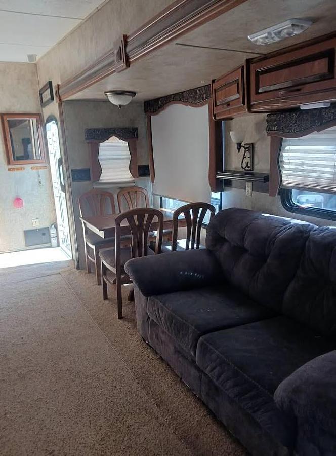 Used 2012 Keystone Loredo 324RL Fifth Wheel