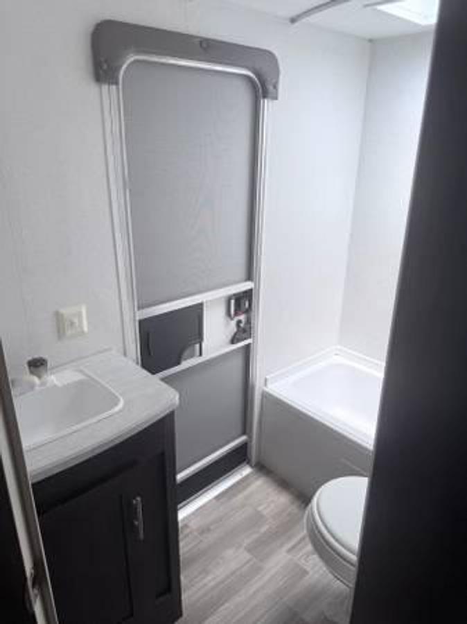 Used 2018 Forest River Wildwood X-Lite 263BH XL | Bunkhouse | Outdoor Kitchen | Fireplace | Like New