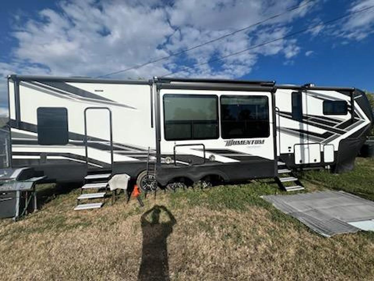Used 2021 Grand Design Momentum 5th Wheel Toy Hauler
