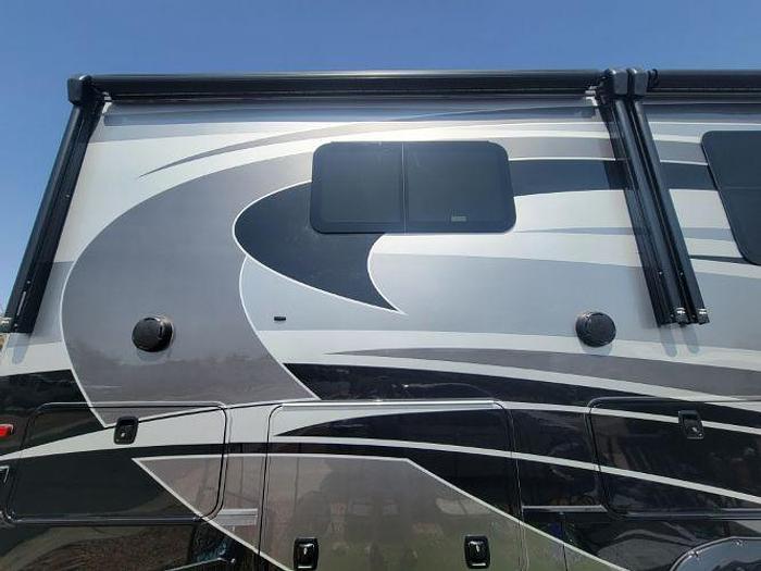 Used 2022 Forest River Riverstone Legacy Fifth Wheel Toy Hauler