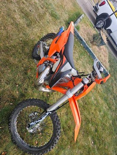 Used 2022 Forest River Cherokee Wolf Pack 315PACK12 and 2019 KTM 250 XC-W