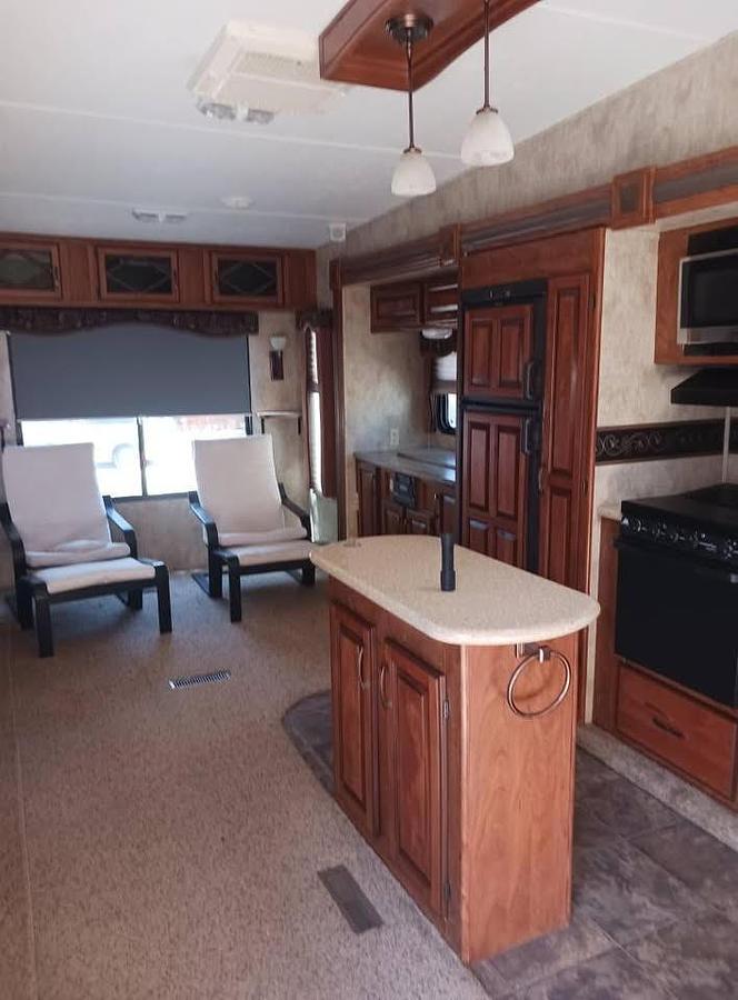 Used 2012 Keystone Loredo 324RL Fifth Wheel
