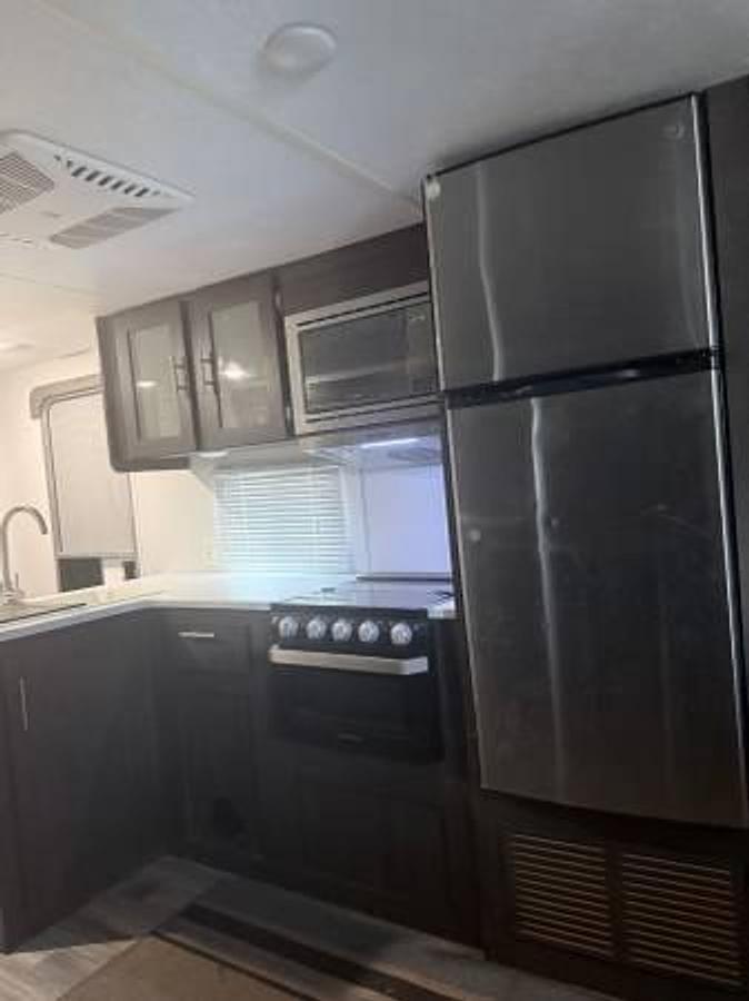 Used 2018 Forest River Wildwood X-Lite 263BH XL | Bunkhouse | Outdoor Kitchen | Fireplace | Like New