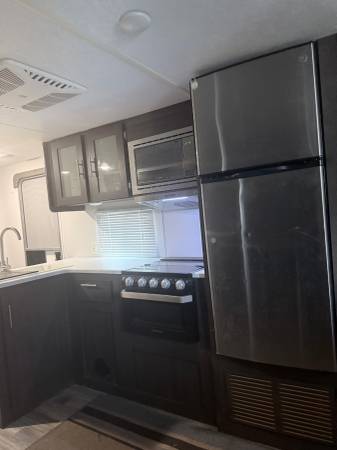 Used 2018 Forest River Wildwood X-Lite 263BH XL | Bunkhouse | Outdoor Kitchen | Fireplace | Like New