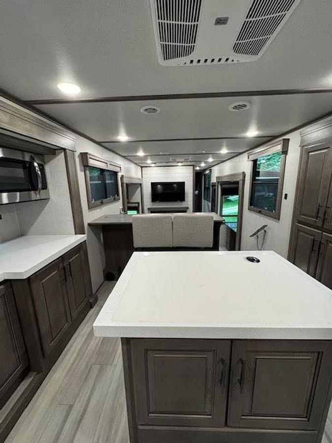 Used 2024 Grand Design Solitude 390RK Fifth Wheel