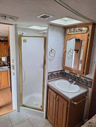 Used 2012 RAM 2500 and 2003 NuWa Hitchhiker Discover America