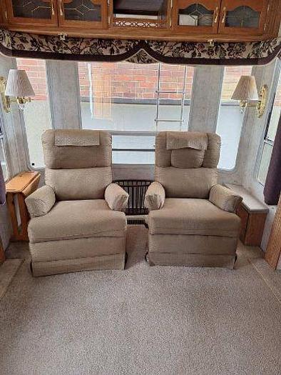 Used 2012 RAM 2500 and 2003 NuWa Hitchhiker Discover America