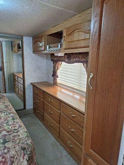 Used 2012 RAM 2500 and 2003 NuWa Hitchhiker Discover America