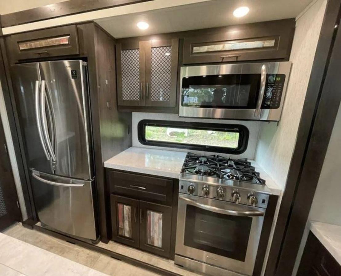 Used 2021 Grand Design MOMENTUM 376THS Fifth Wheel