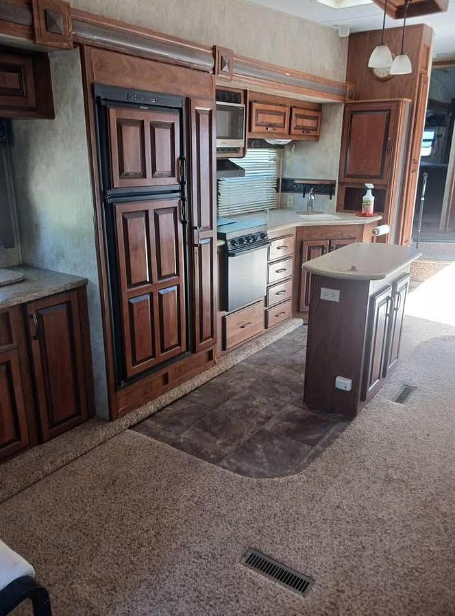 Used 2012 Keystone Loredo 324RL Fifth Wheel