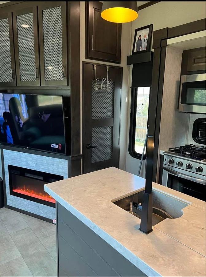 Used 2021 Grand Design Momentum 5th Wheel Toy Hauler