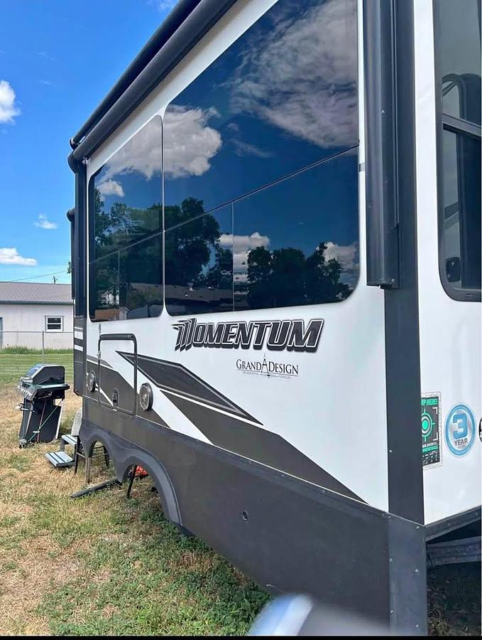 Used 2021 Grand Design Momentum 5th Wheel Toy Hauler