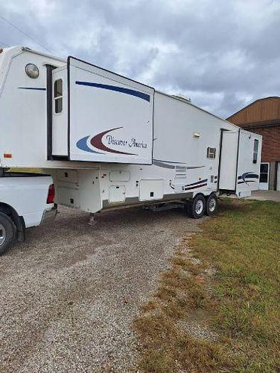 Used 2012 RAM 2500 and 2003 NuWa Hitchhiker Discover America