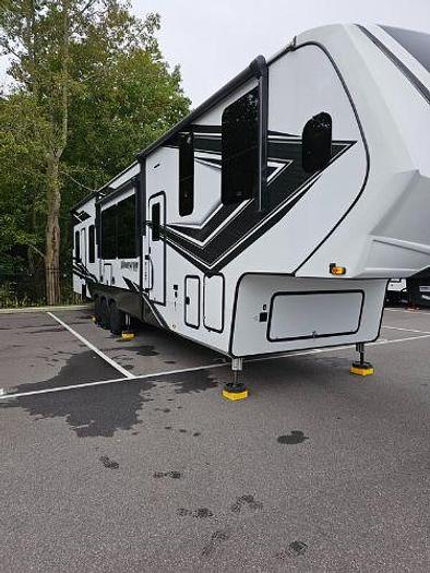 Used 2022 Grand Design Momentum M-Class 395MSR