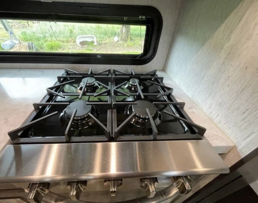 Used 2021 Grand Design MOMENTUM 376THS Fifth Wheel