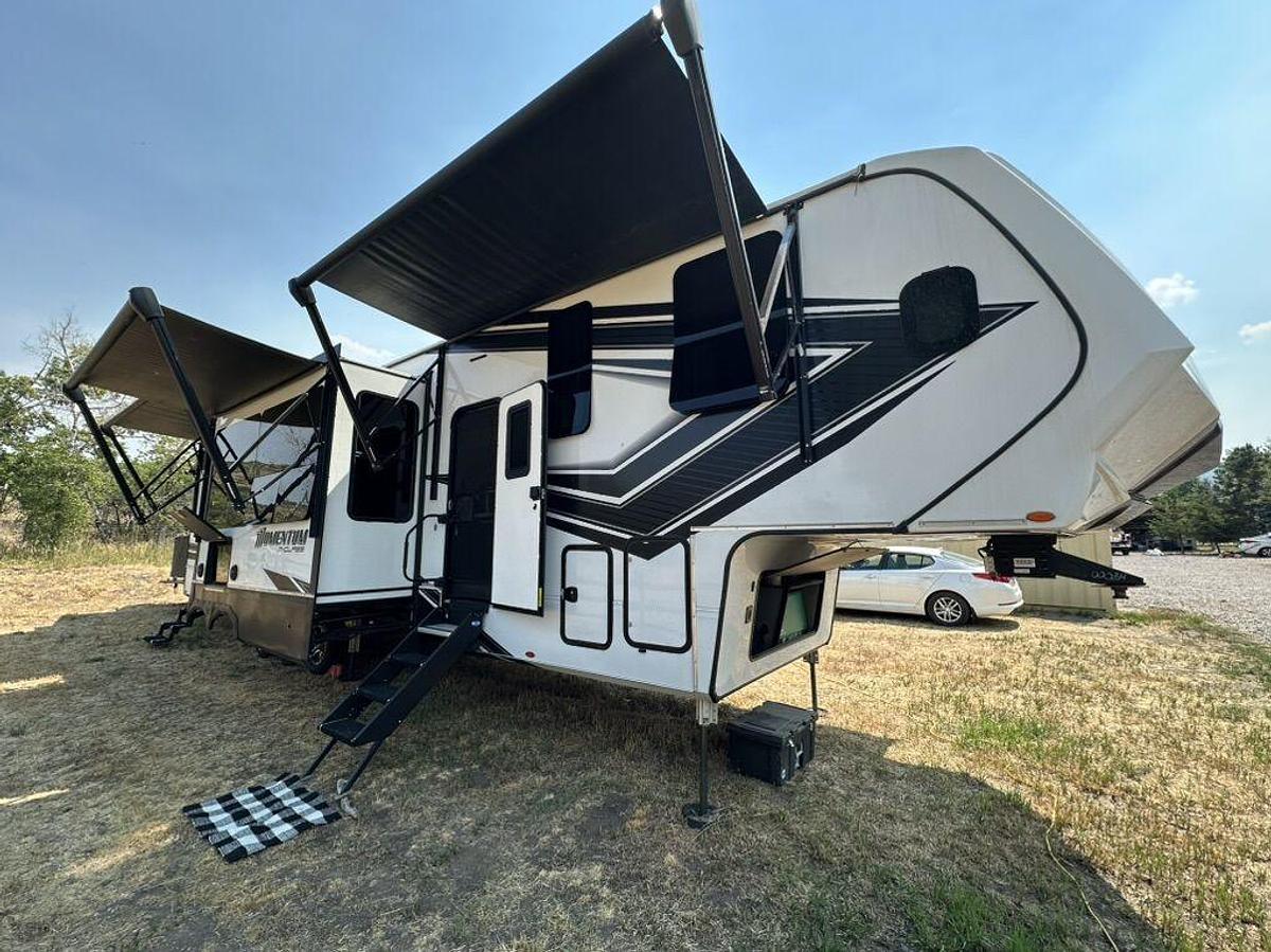 Used 2023 Grand Design Momentum M-395MS Fifth Wheel Toy Hauler