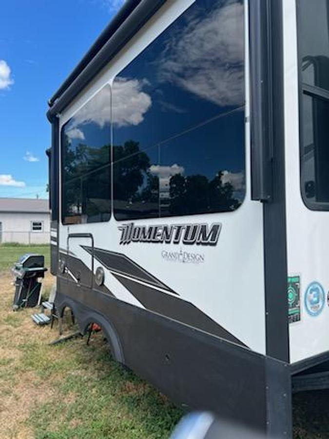 Used 2021 Grand Design Momentum 5th Wheel Toy Hauler