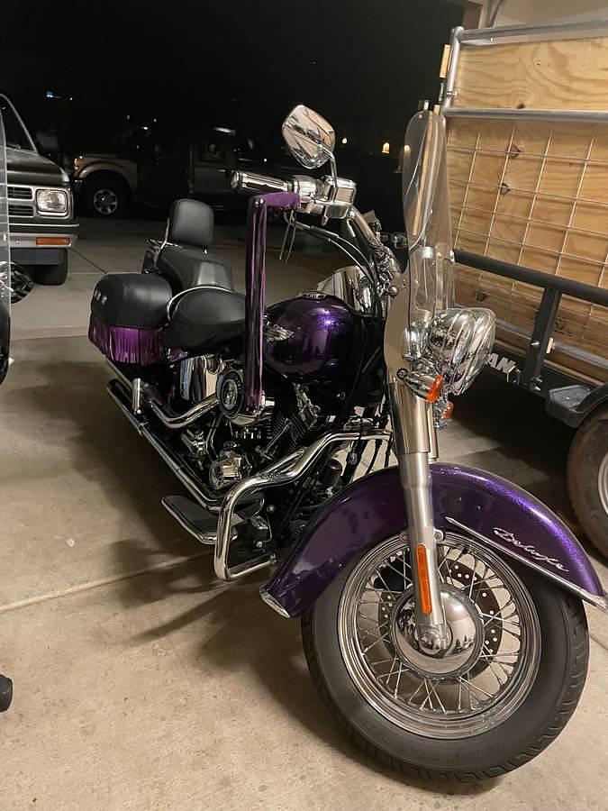 Used 2014 Harley Davidson Softtail Deluxe FLSTN ‘Hard Candy Voodoo Purple Flake