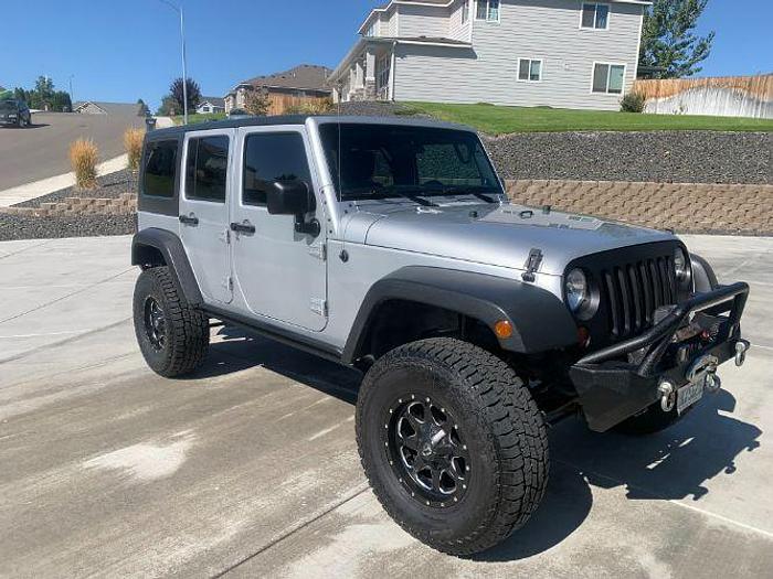 Used 2011 Jeep Wrangler Unlimited Sport