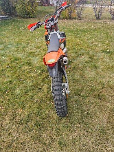 Used 2022 Forest River Cherokee Wolf Pack 315PACK12 and 2019 KTM 250 XC-W