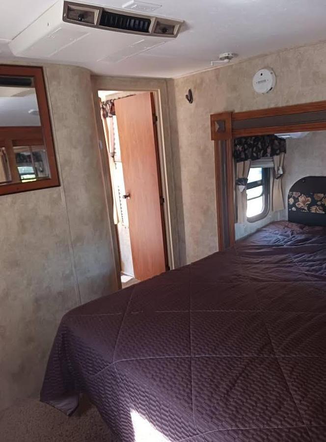 Used 2012 Keystone Loredo 324RL Fifth Wheel