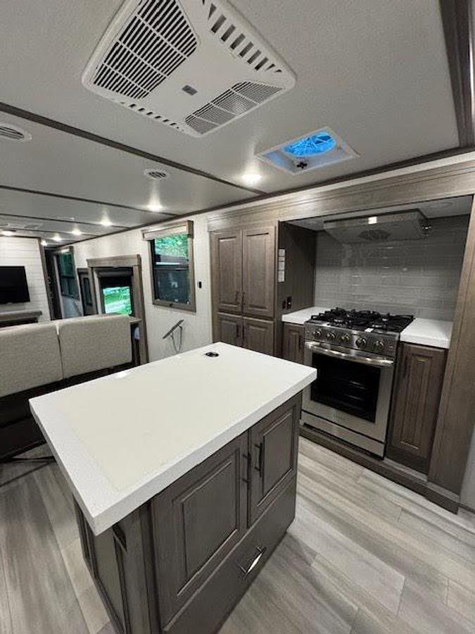 Used 2024 Grand Design Solitude 390RK Fifth Wheel