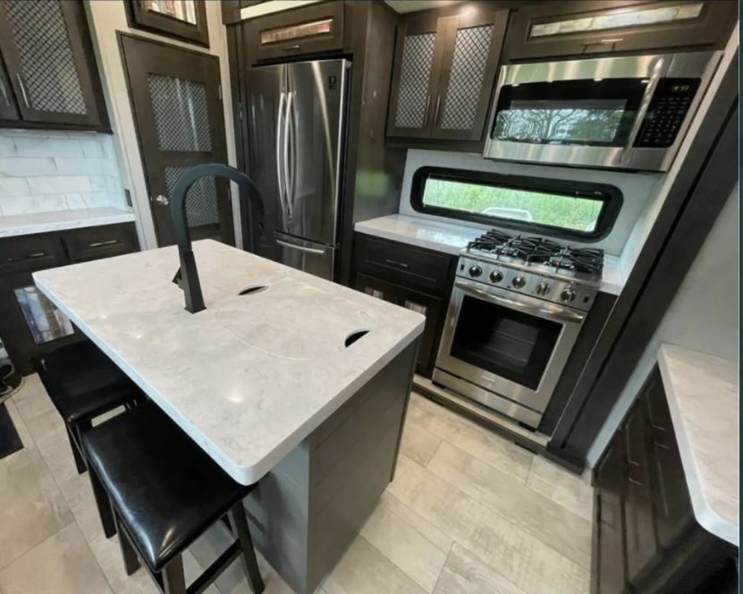 Used 2021 Grand Design MOMENTUM 376THS Fifth Wheel