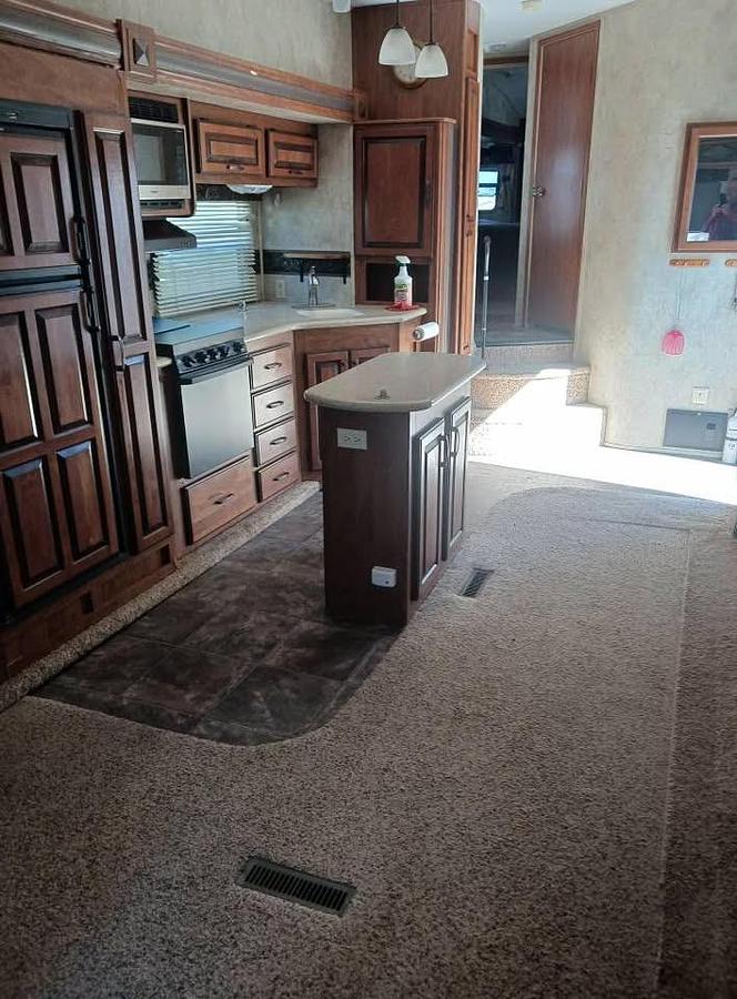 Used 2012 Keystone Loredo 324RL Fifth Wheel