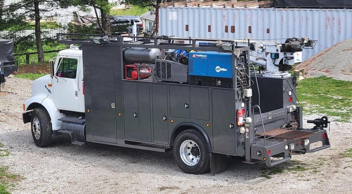 Used 1999 International 8100 with 2011 Auto Crane 10006H