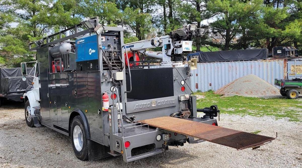 Used 1999 International 8100 with 2011 Auto Crane 10006H