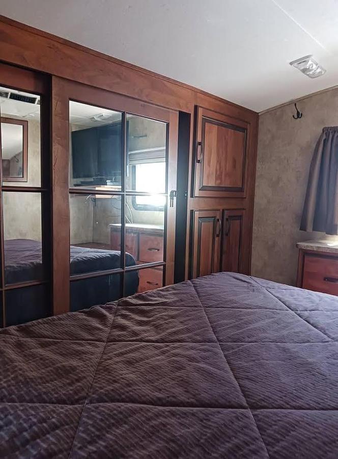 Used 2012 Keystone Loredo 324RL Fifth Wheel