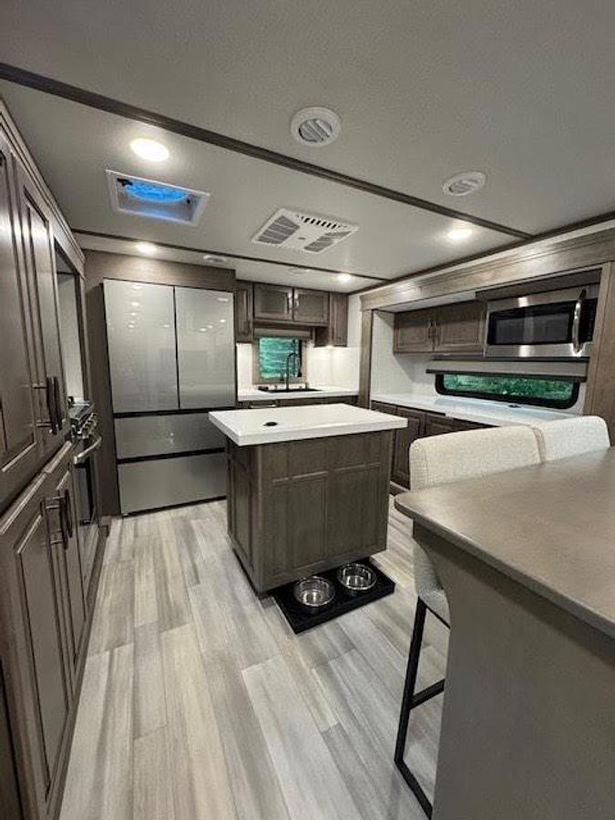 Used 2024 Grand Design Solitude 390RK Fifth Wheel