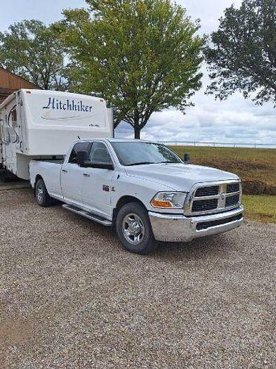 Used 2012 RAM 2500 and 2003 NuWa Hitchhiker Discover America