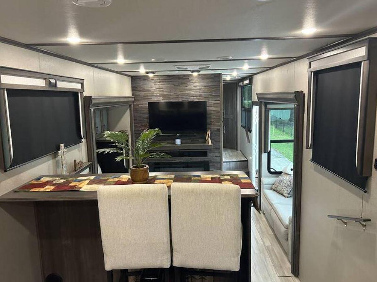Used 2022 Grand Design Solitude 390RK Fifth Wheel