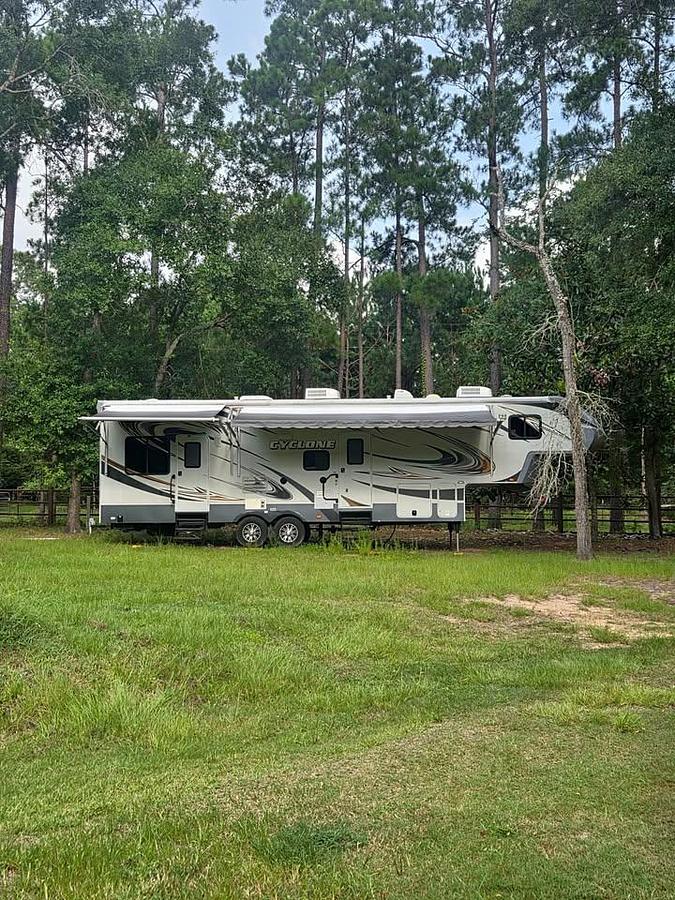Used 2013 Heartland Cyclone Toy Hauler Fifth Wheel
