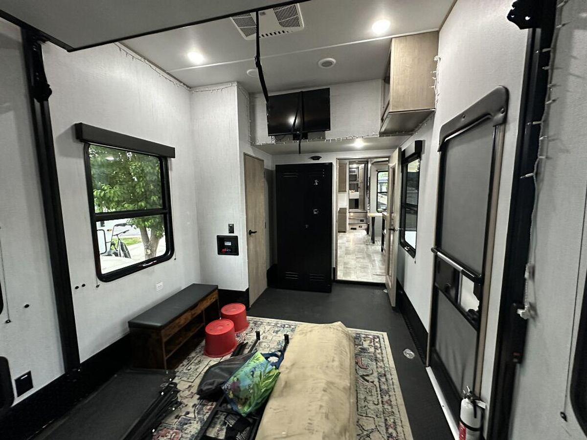 Used 2023 Grand Design Momentum M-395MS Fifth Wheel Toy Hauler