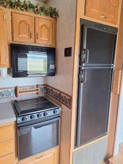 Used 2012 RAM 2500 and 2003 NuWa Hitchhiker Discover America