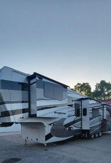 Used 2022 Forest River Riverstone Legacy Fifth Wheel Toy Hauler