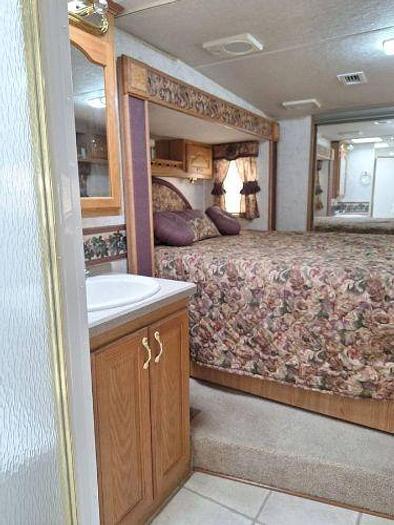 Used 2012 RAM 2500 and 2003 NuWa Hitchhiker Discover America