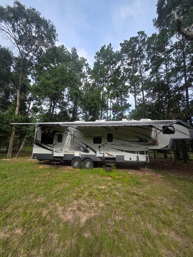Used 2013 Heartland Cyclone Toy Hauler Fifth Wheel