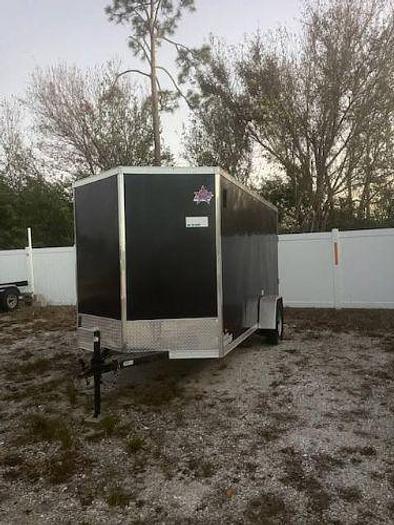 Used 2015 Harley Davidson with a 6x12 enclosed utility trailer