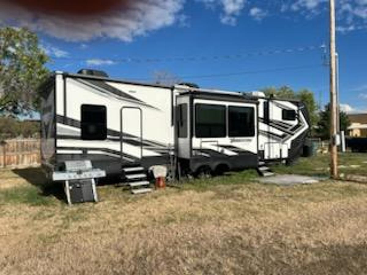 Used 2021 Grand Design Momentum 5th Wheel Toy Hauler